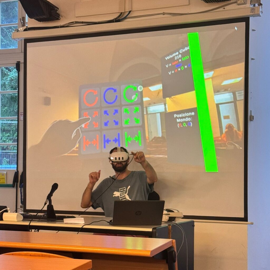 Mosè Colangelo is presenting wearing a virtual reality headset.
