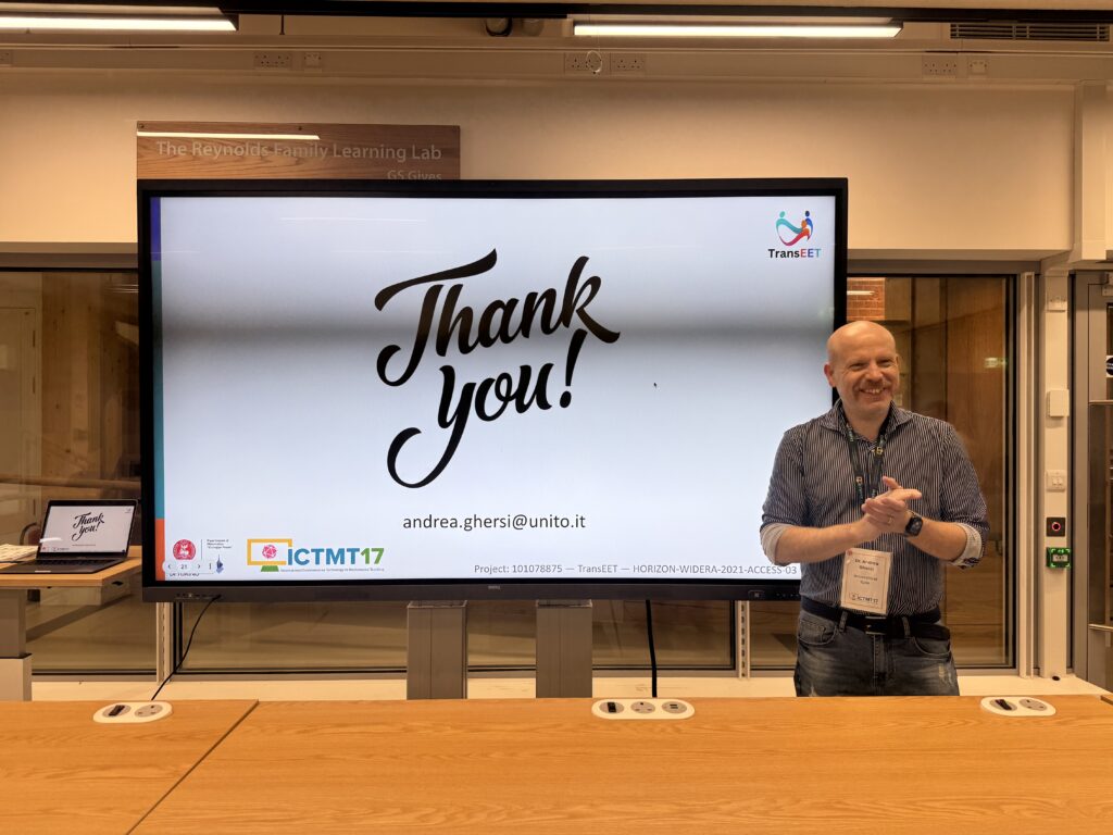 Andrea Ghersi stands and smiles in front of a presentation slide that reads “Thank you!” during ICTMT 17 in London. The slide includes his contact email and the TransEET, University of Turin, and ICTMT 17 logos.